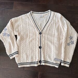 Taylor Swift folklore sweater.